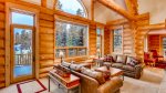 Living room opens up to main balcony with gorgeous mountain views